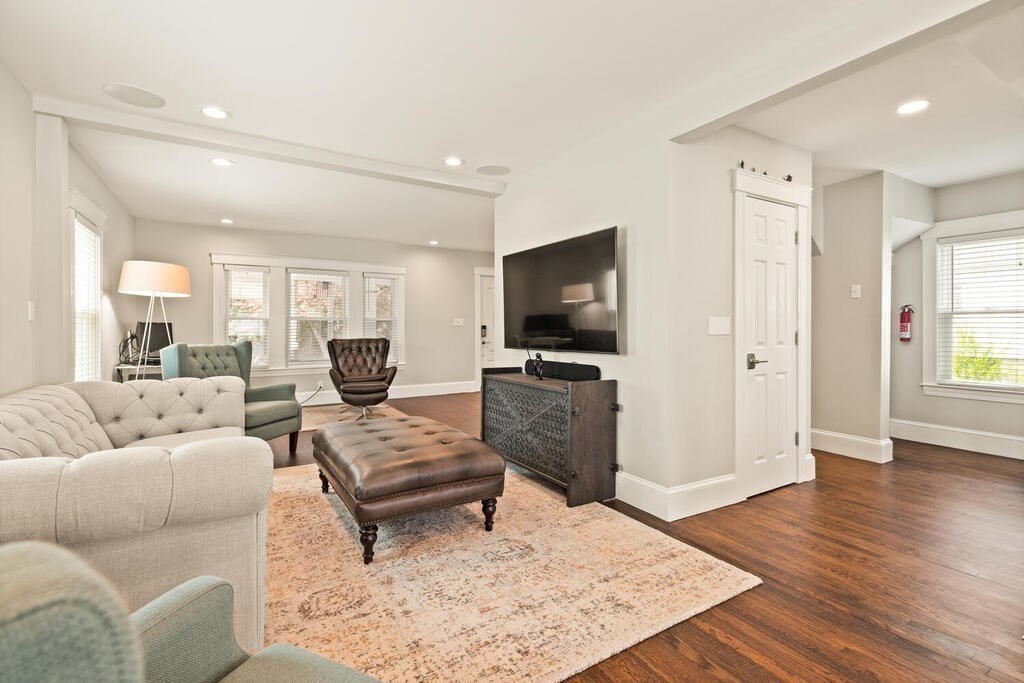 43 Guild Street Medford, MA 02155 - Photo 6 of 33 a living room with furniture and a flat screen tv