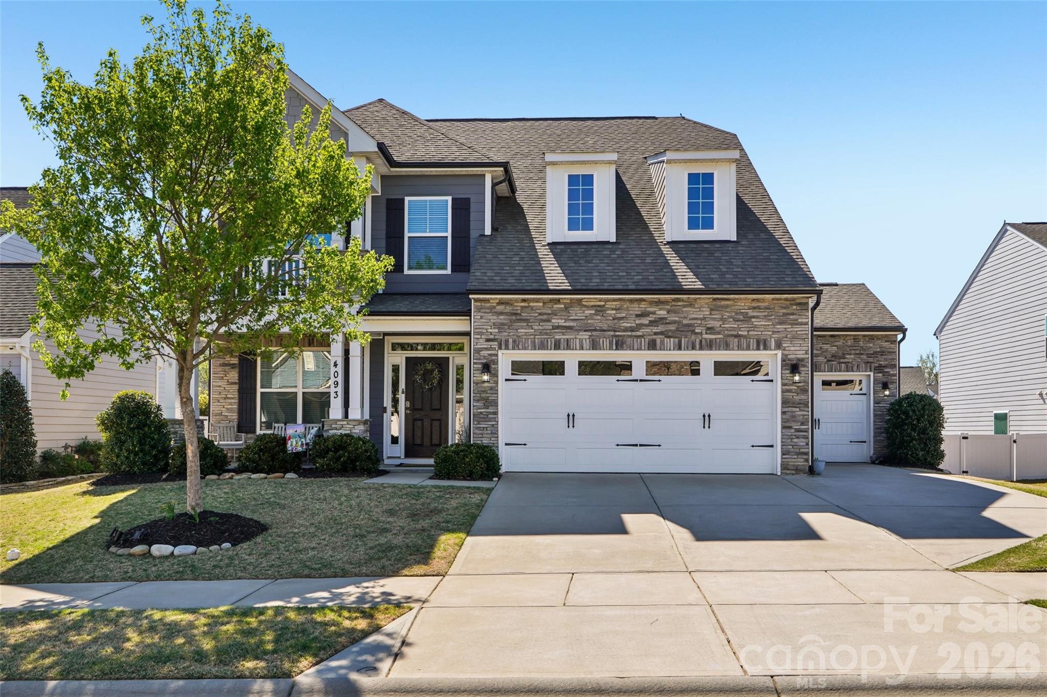 a front view of a house with entertaining space