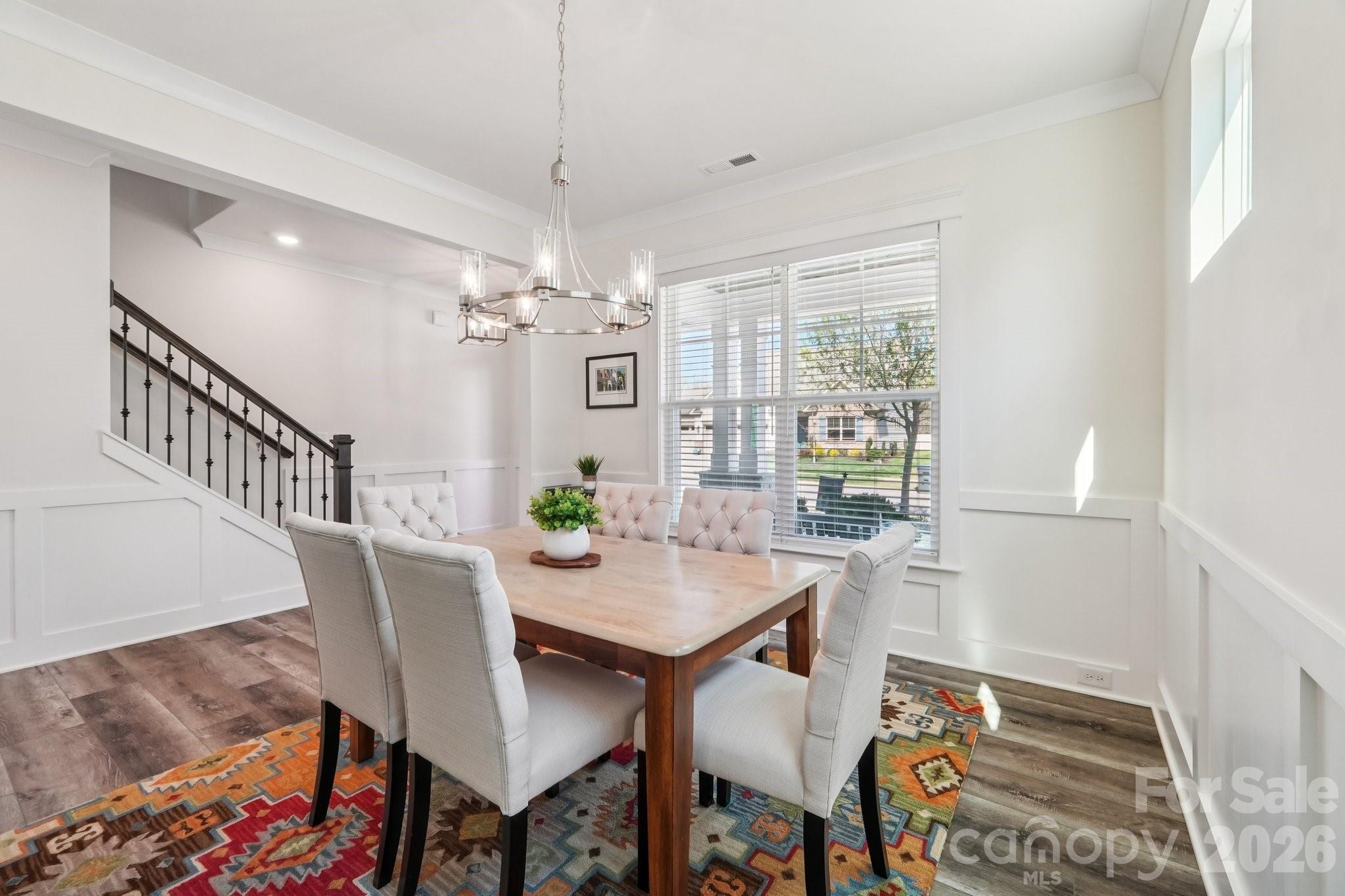 4093 Clapton Drive Lancaster, SC 29720 - Photo 11 of 48 a view of a dining room with furniture and chandelier