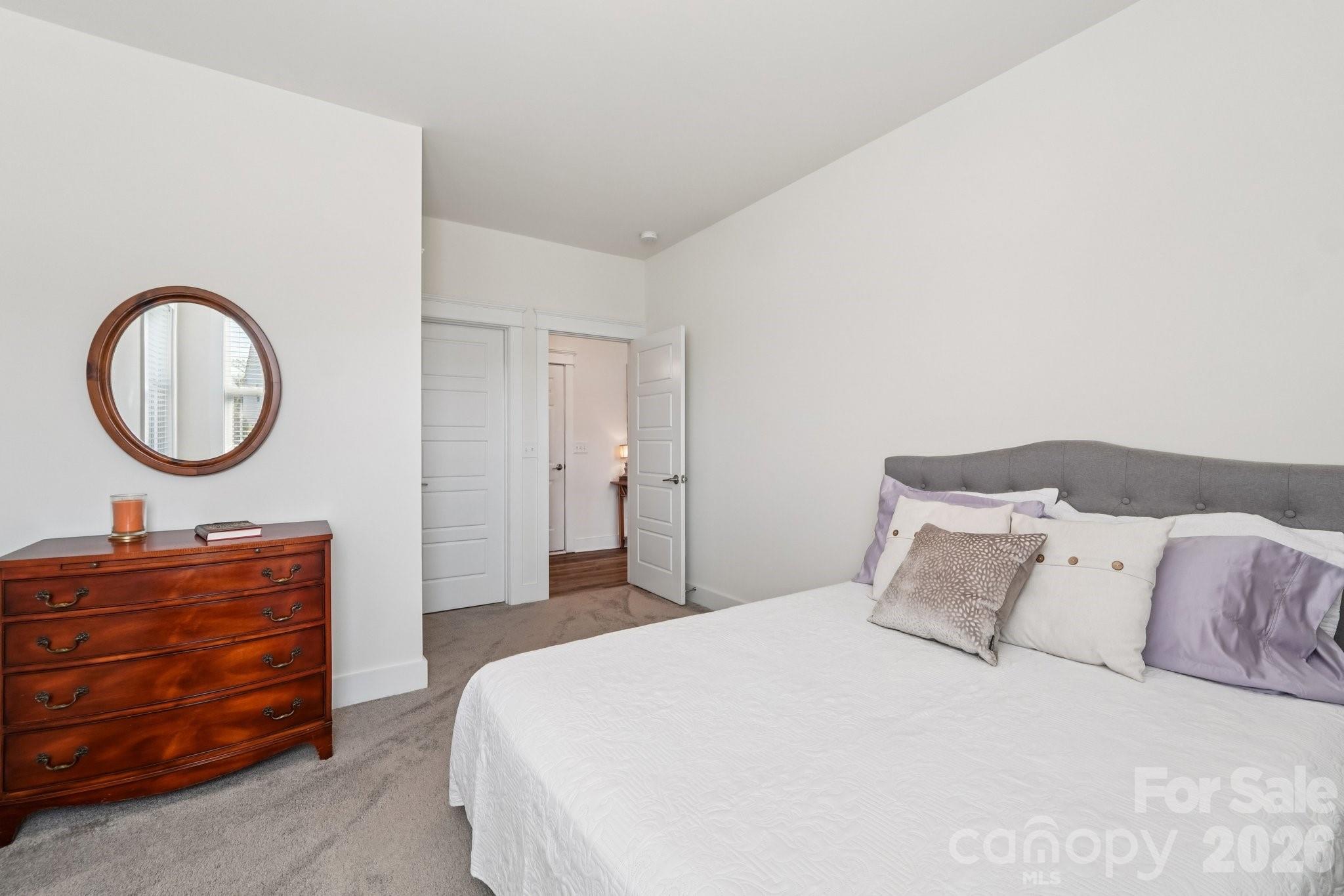 4093 Clapton Drive Lancaster, SC 29720 - Photo 19 of 48 a bedroom with a bed and a dresser