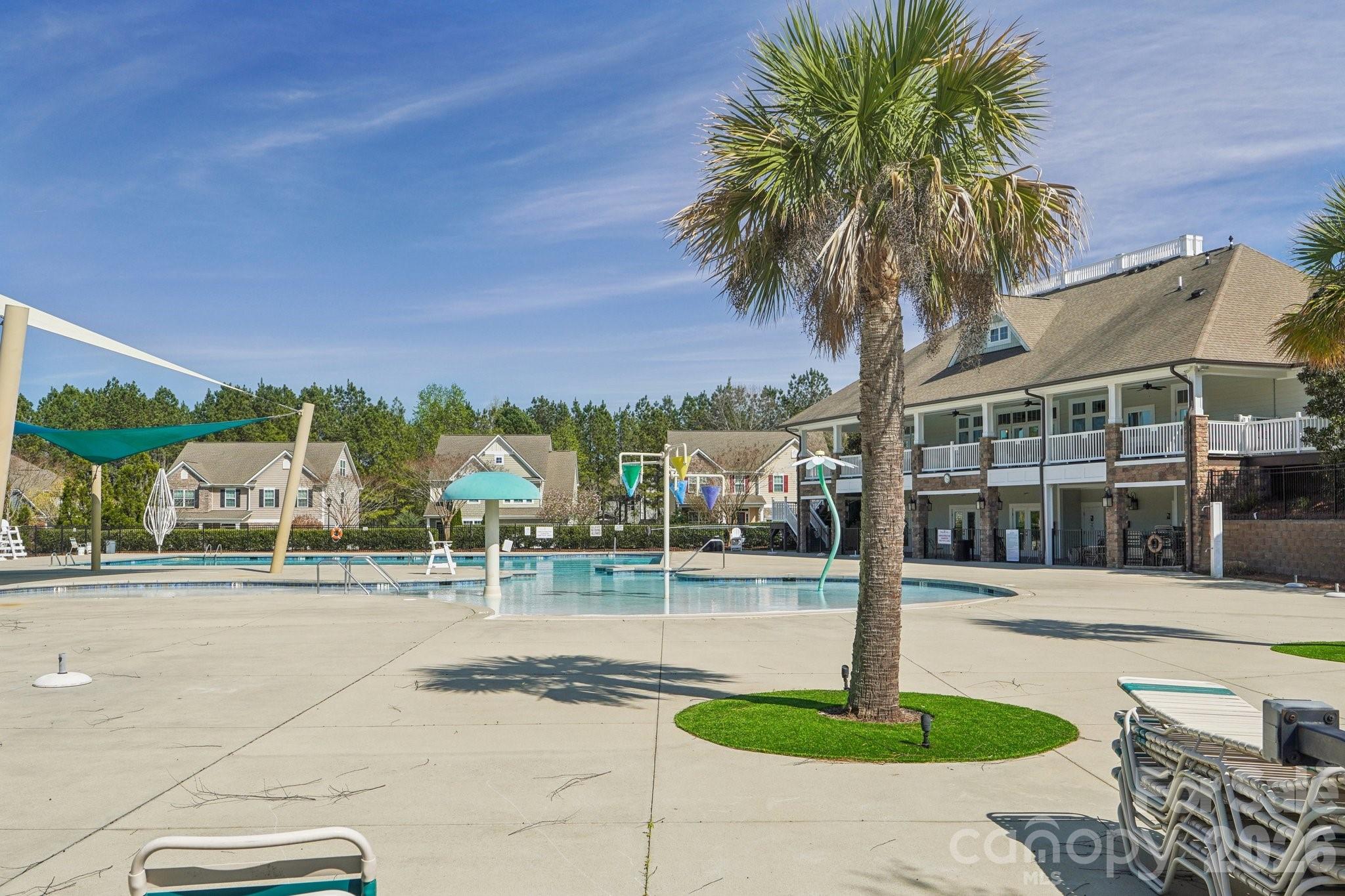 4093 Clapton Drive Lancaster, SC 29720 - Photo 47 of 48 a swimming pool with outdoor seating and yard