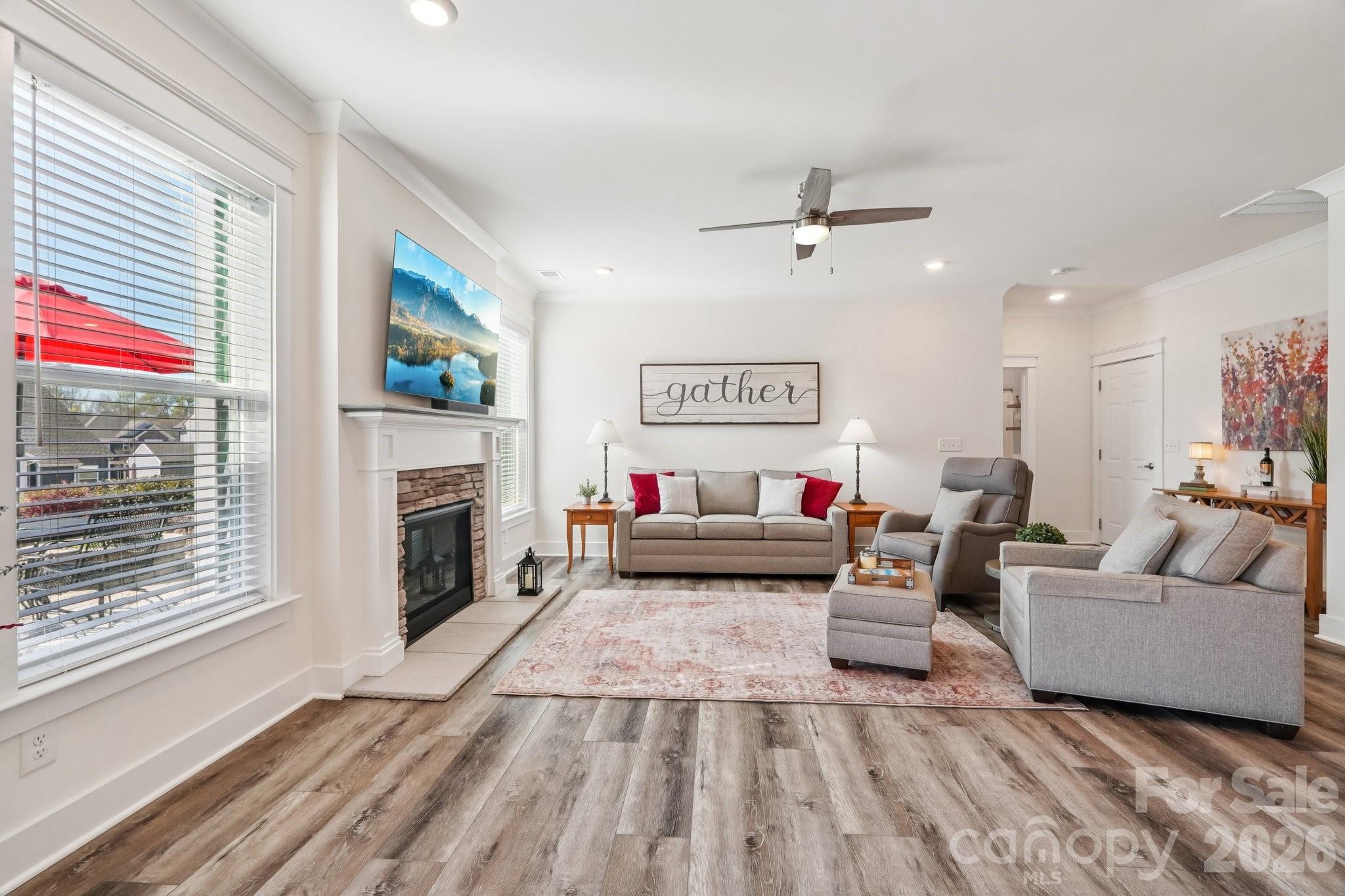 4093 Clapton Drive Lancaster, SC 29720 - Photo 6 of 48 a living room with furniture and a fireplace