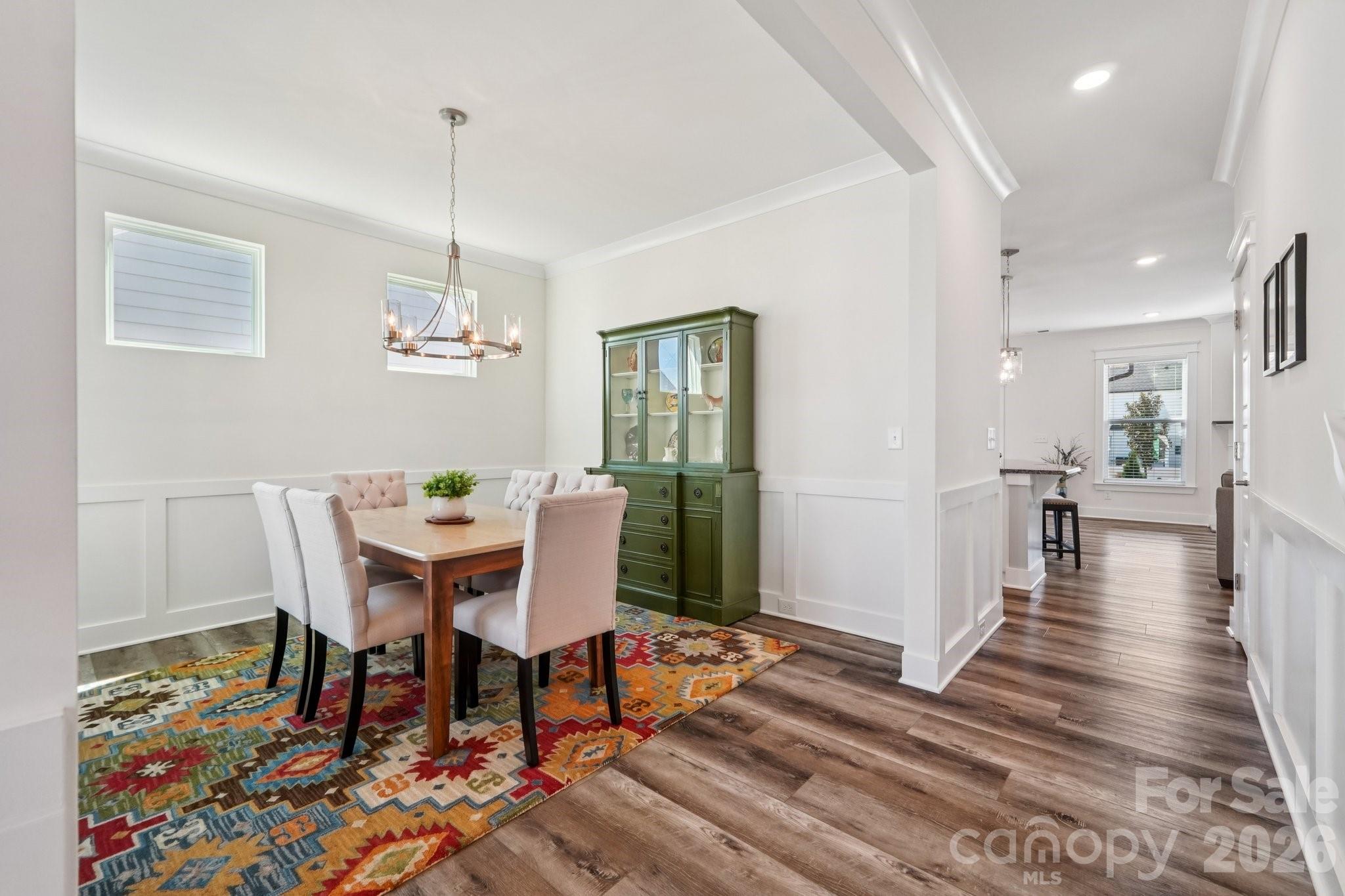 4093 Clapton Drive Lancaster, SC 29720 - Photo 9 of 48 a view of a dining room with furniture window and wooden floor