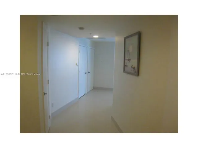 a view of an empty walk in a closet