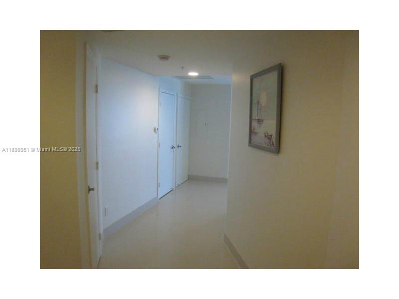 60 Southwest 13th Street, Unit 1900 Miami, FL 33130 - Photo 24 of 95 a open hall with a bench