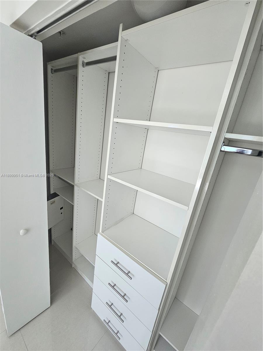 60 Southwest 13th Street, Unit 1900 Miami, FL 33130 - Photo 40 of 95 a view of walk in closet