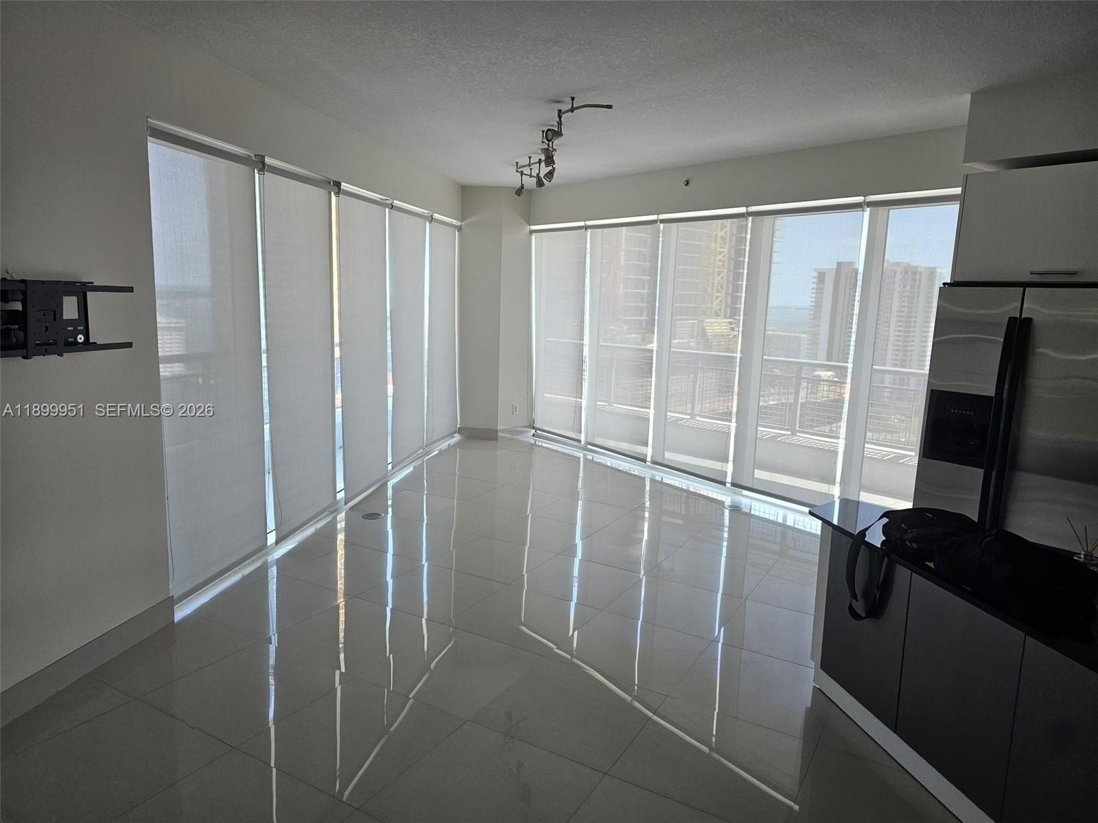 60 Southwest 13th Street, Unit 1900 Miami, FL 33130 - Photo 65 of 96 Dinning Rm/ LivingRm Wrap Around Balcony