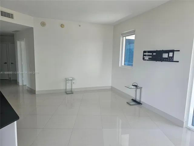 an empty room with window