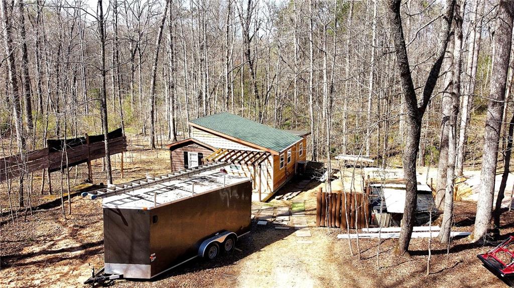 1125 Pecks Road Dahlonega, GA 30533 - Photo 2 of 35 a view of a balcony with chairs