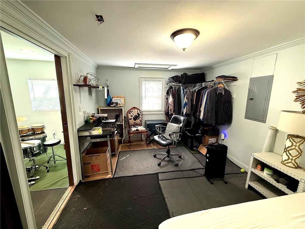 1125 Pecks Road Dahlonega, GA 30533 - Photo 27 of 35 a living room with furniture a window and gym equipment
