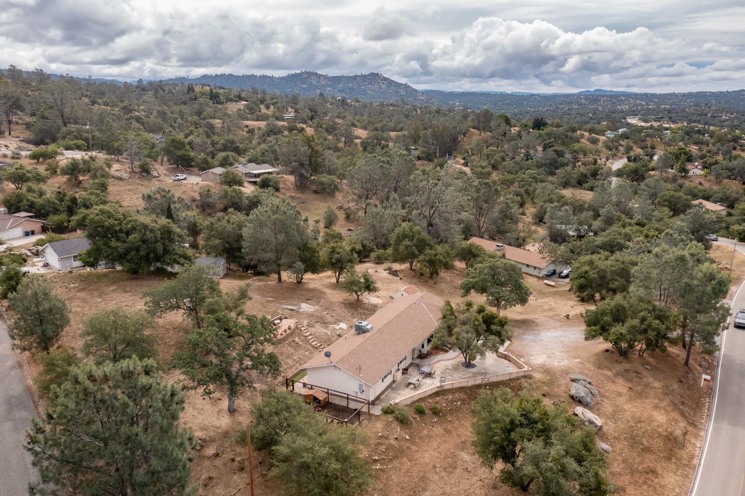 29395 Revis Road Coarsegold, CA 93614 - Photo 29 of 32 an aerial view of a houses with a yard