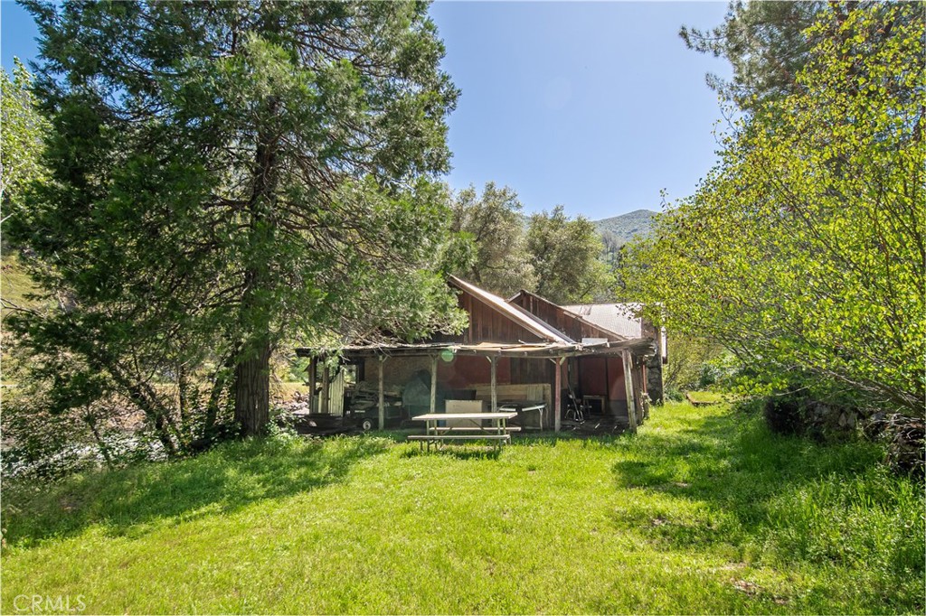 10049 Incline Road El Portal, CA 95318 - Photo 5 of 44 a front view of a house with a yard