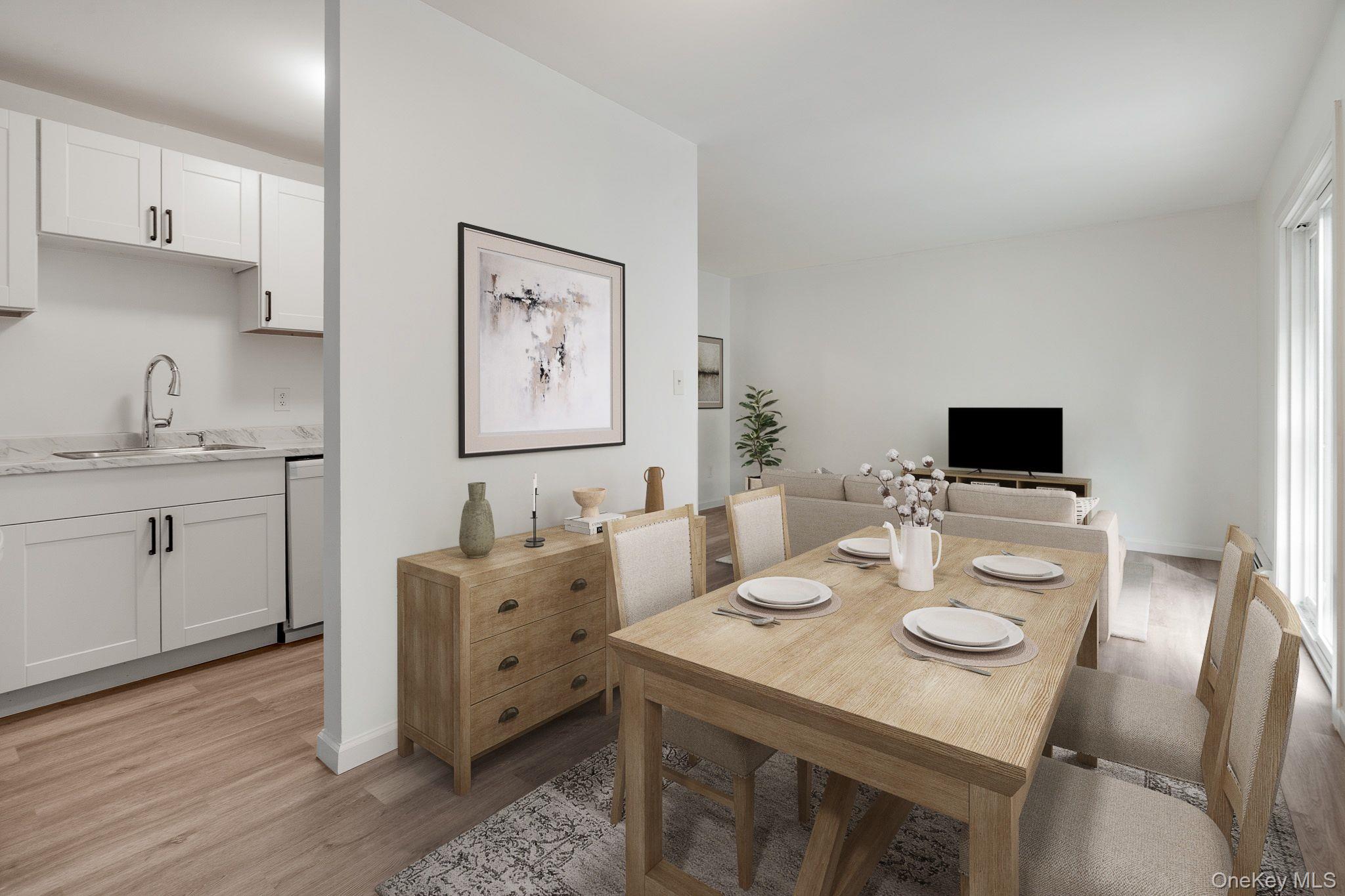 1 Locust Court, Unit C Fishkill, NY 12524 - Photo 4 of 21 a view of a dining room with furniture and wooden floor