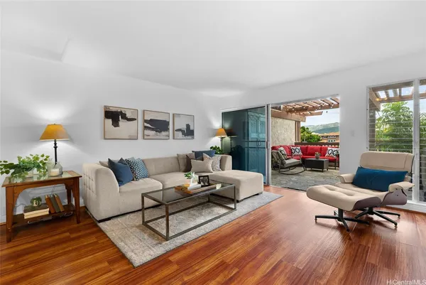 a living room with furniture and a table