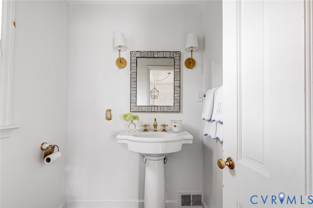7706 Stuart Hall Road Henrico, VA 23229 - Photo 22 of 50 Renovated powder room, new pedestal sink and acces