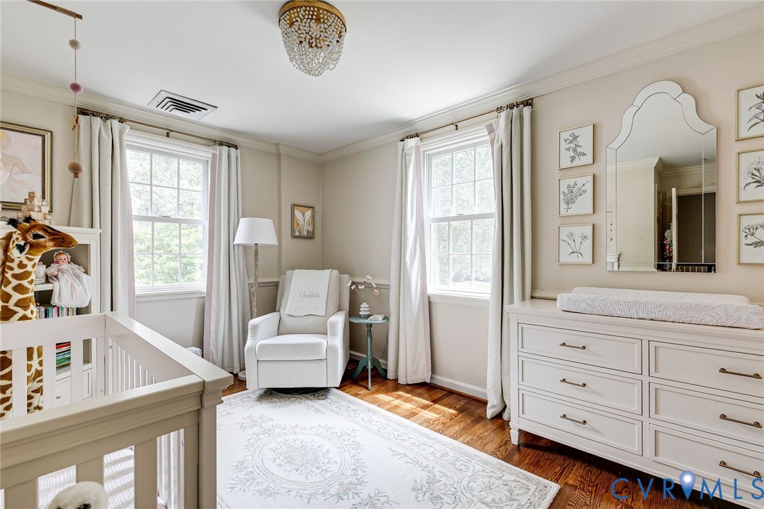 7706 Stuart Hall Road Henrico, VA 23229 - Photo 36 of 50 Spacious bedroom with fresh paint, hardwood floors