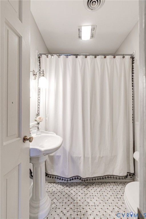 7706 Stuart Hall Road Henrico, VA 23229 - Photo 38 of 50 Hall bath fully renovated with new tub, marble til