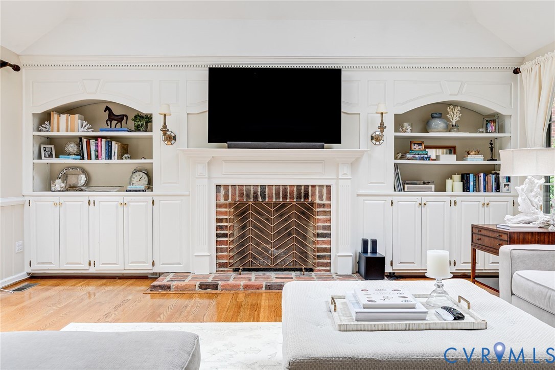 7706 Stuart Hall Road Henrico, VA 23229 - Photo 10 of 50 Custom bookcases, fireplace converted from wood to