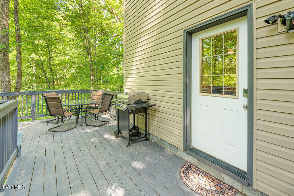 115 Jenny Way Cosby, TN 37722 - Photo 31 of 35 32_115JennyWayCosby_SidePorch1_WEB