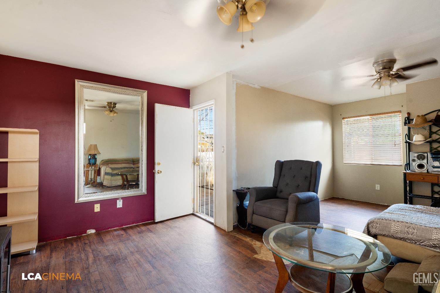 Undisclosed Address Bakersfield, CA 93308 - Photo 13 of 19 a living room with furniture and a window
