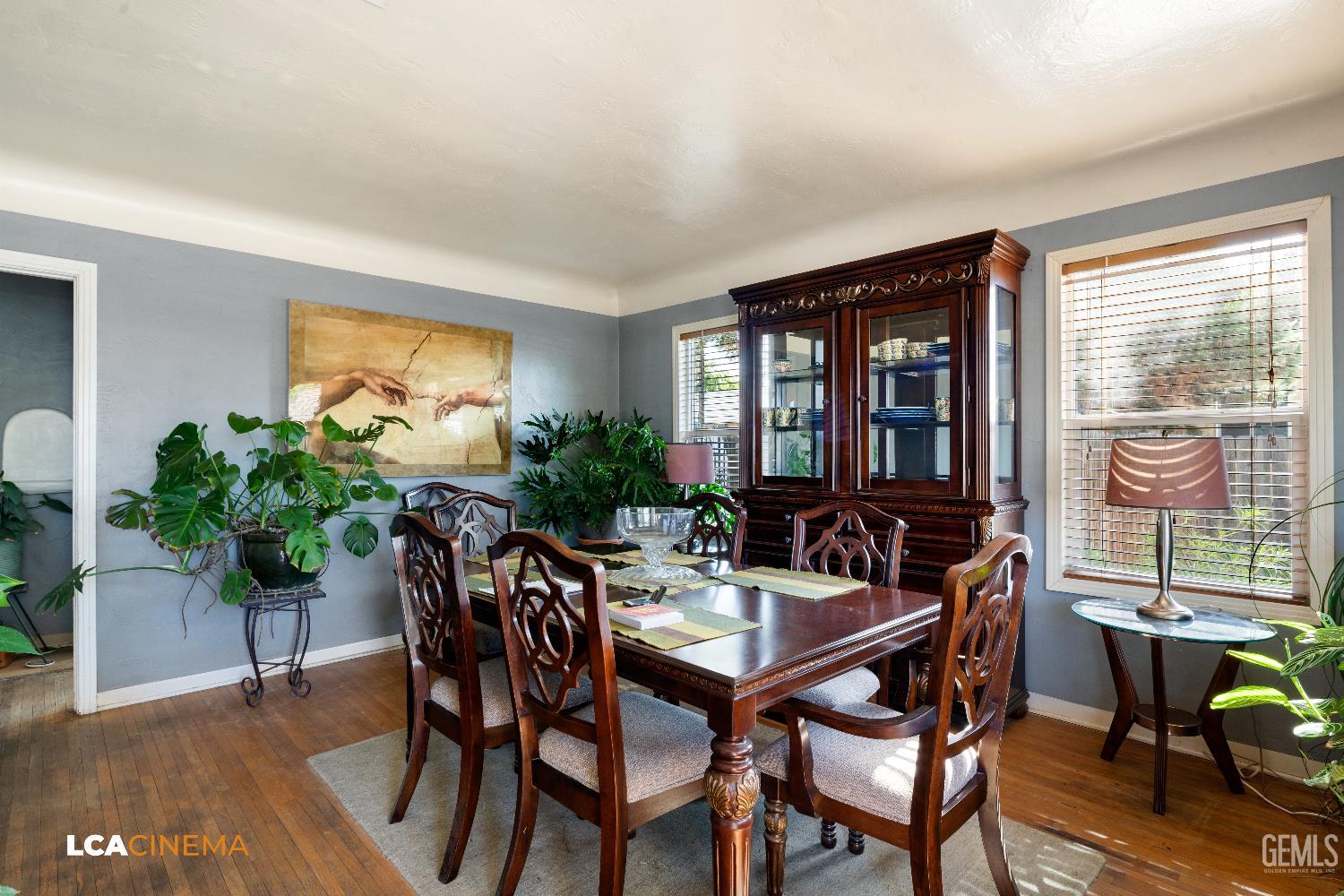 Undisclosed Address Bakersfield, CA 93308 - Photo 4 of 19 a view of a dining room with furniture window and wooden floor