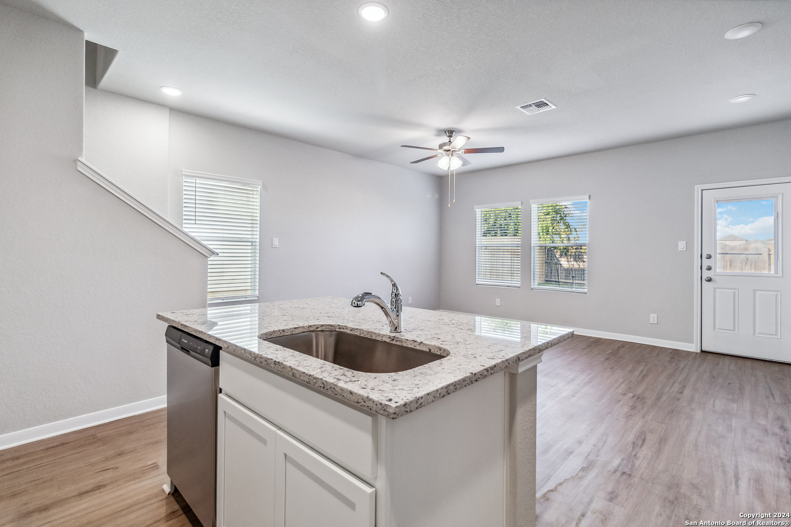3928 Abbott Pass St. Hedwig, TX 78152 - Photo 6 of 35 a kitchen with sink and refrigerator