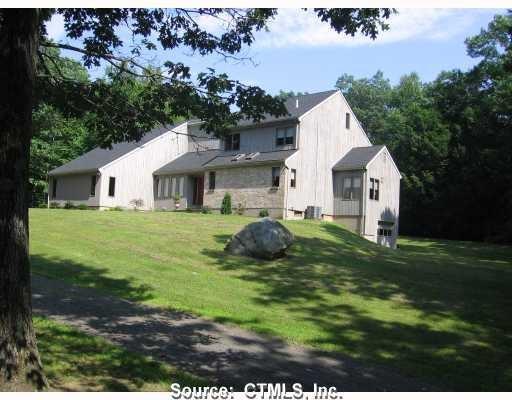 101 Burbank Road Ellington, CT 06029 - Photo 1 of 1 a view of a house with a yard