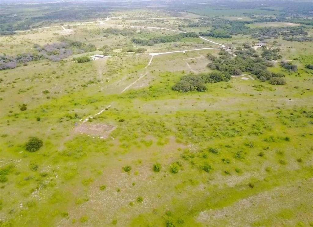 109 Comanche Hills Comanche, TX 76442 - Photo 20 of 25 a view of beach with green space