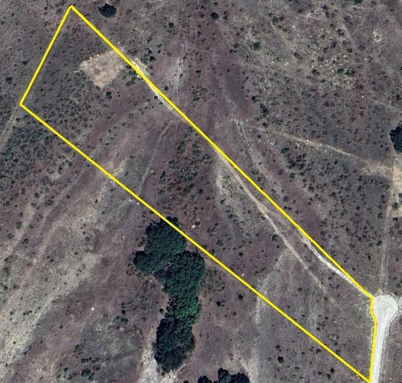 109 Comanche Hills Comanche, TX 76442 - Photo 25 of 25 a view of roof and mountain