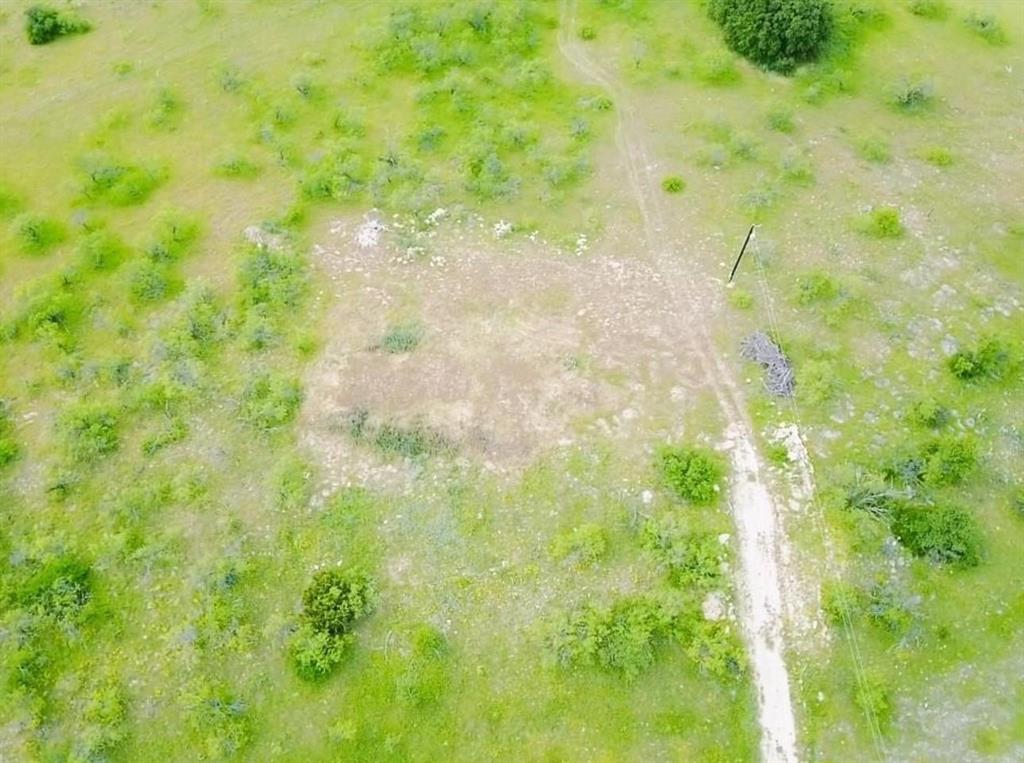 109 Comanche Hills Comanche, TX 76442 - Photo 8 of 25 a view of a small yard