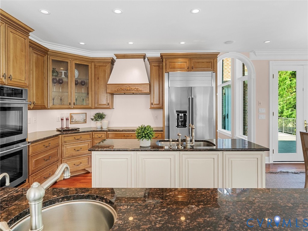 13612 Waterswatch Court Midlothian, VA 23113 - Photo 28 of 88 a kitchen with stainless steel appliances granite countertop a sink and a stove