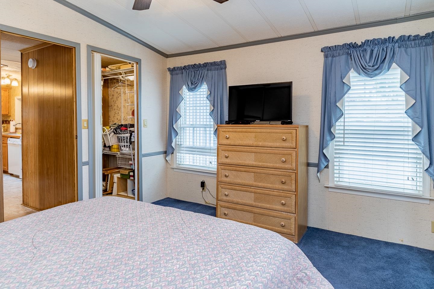 348 Grande Rio Grande, NJ 08242 - Photo 23 of 39 a bedroom with a bed and a television