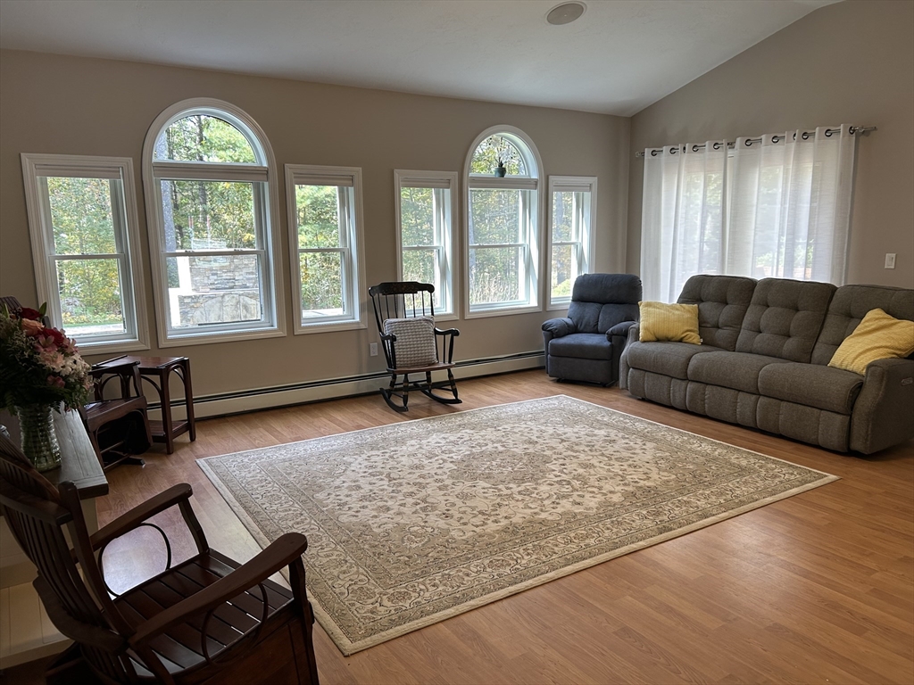 31 Bay Path Road Charlton, MA 01507 - Photo 18 of 42 a living room with furniture and a large window