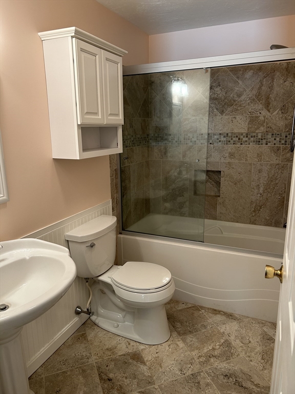 31 Bay Path Road Charlton, MA 01507 - Photo 28 of 42 a bathroom with a toilet and a bathtub