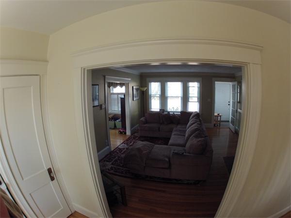 55 Ravine Road Medford, MA 02155 - Photo 4 of 8 a living room with furniture and a mirror