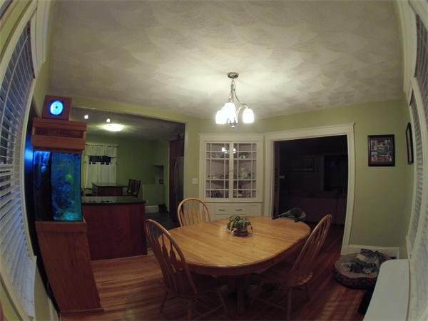 55 Ravine Road Medford, MA 02155 - Photo 7 of 8 a view of a dining room with furniture and chandelier