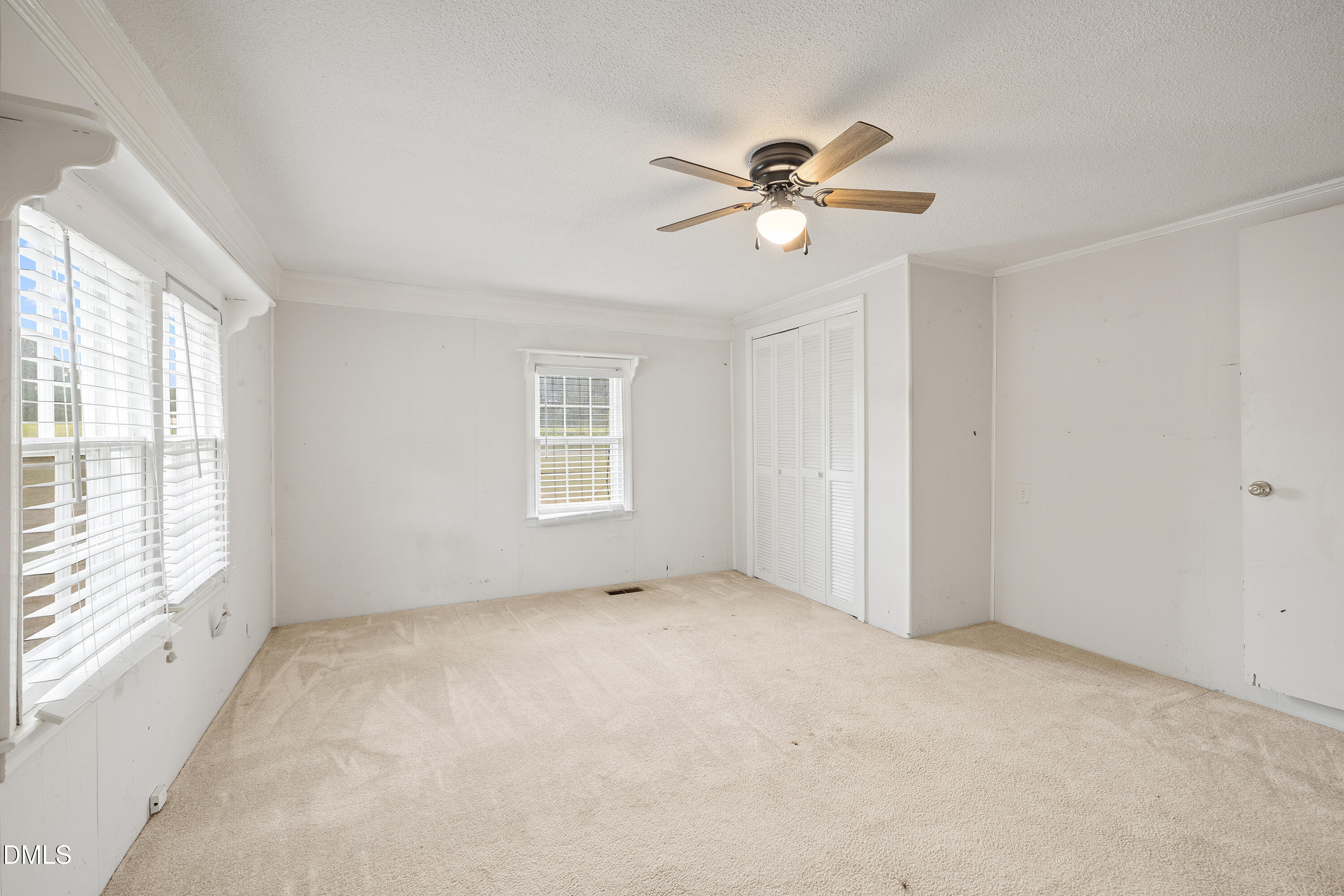 821 Penny Road Angier, NC 27501 - Photo 14 of 25 a view of an empty room with a window