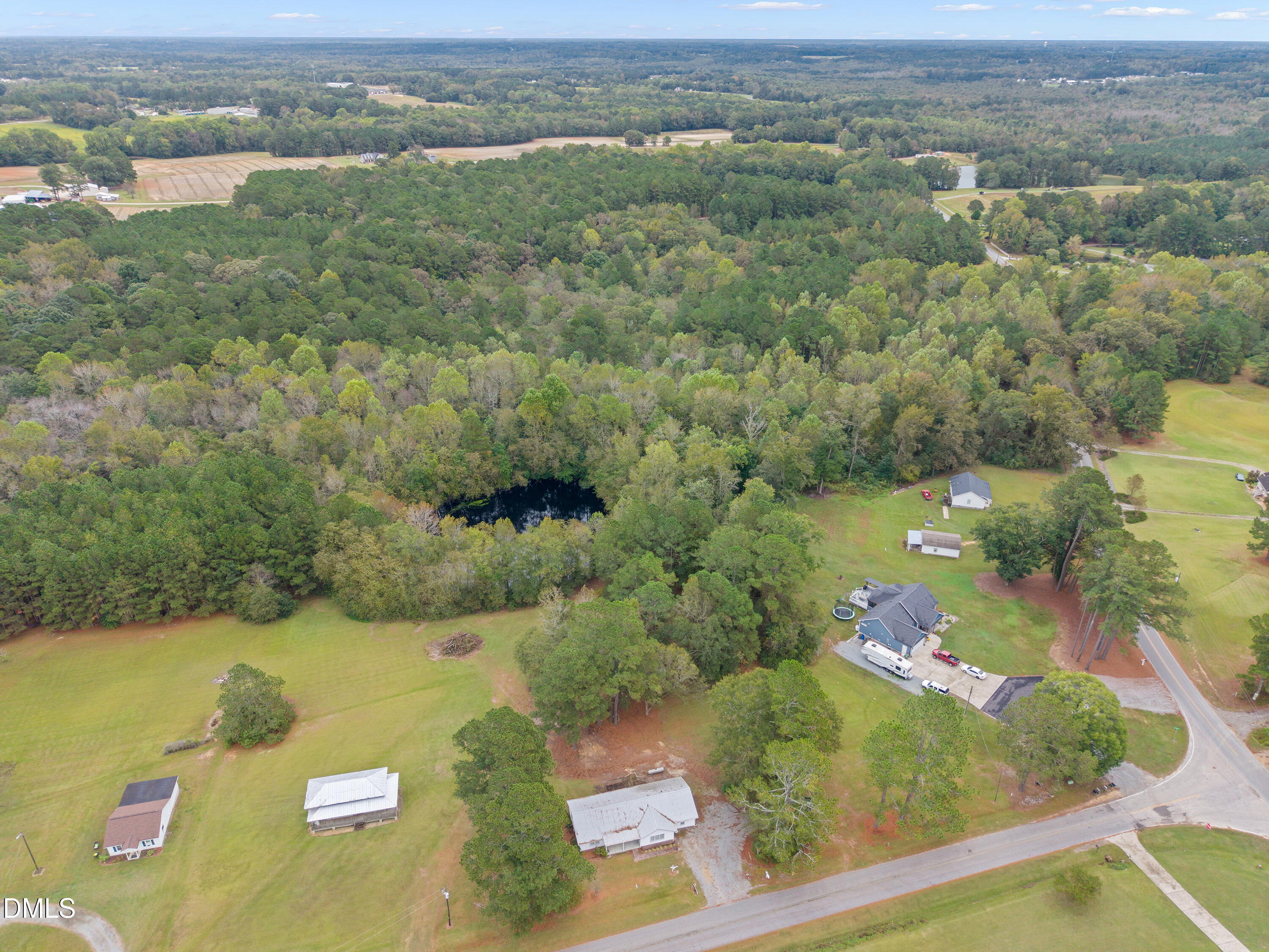 821 Penny Road Angier, NC 27501 - Photo 20 of 25 an aerial view of residential houses with outdoor space
