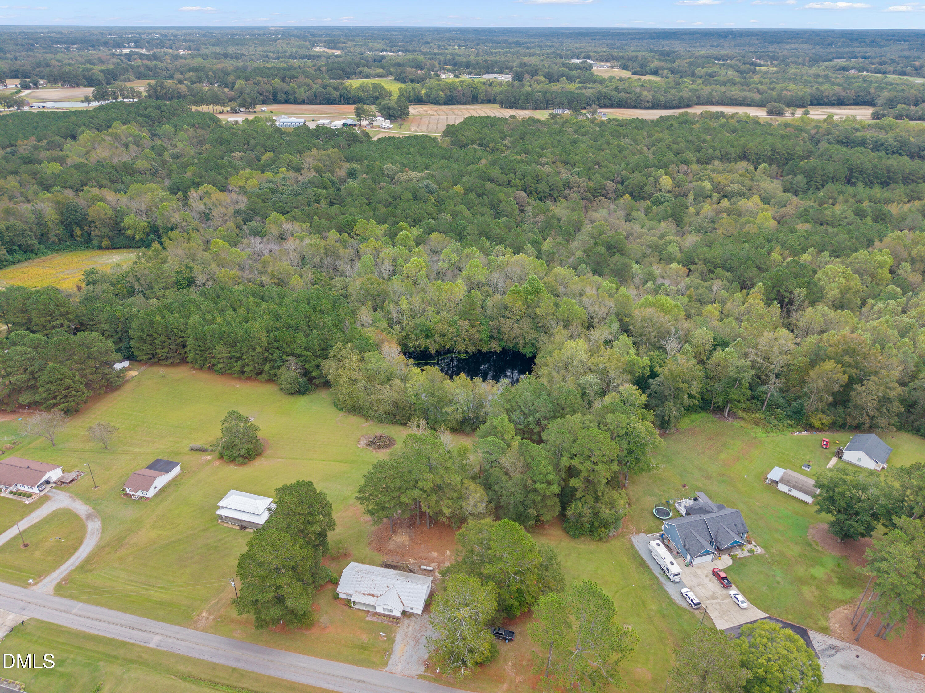 821 Penny Road Angier, NC 27501 - Photo 21 of 25 an aerial view of a residential houses with outdoor space
