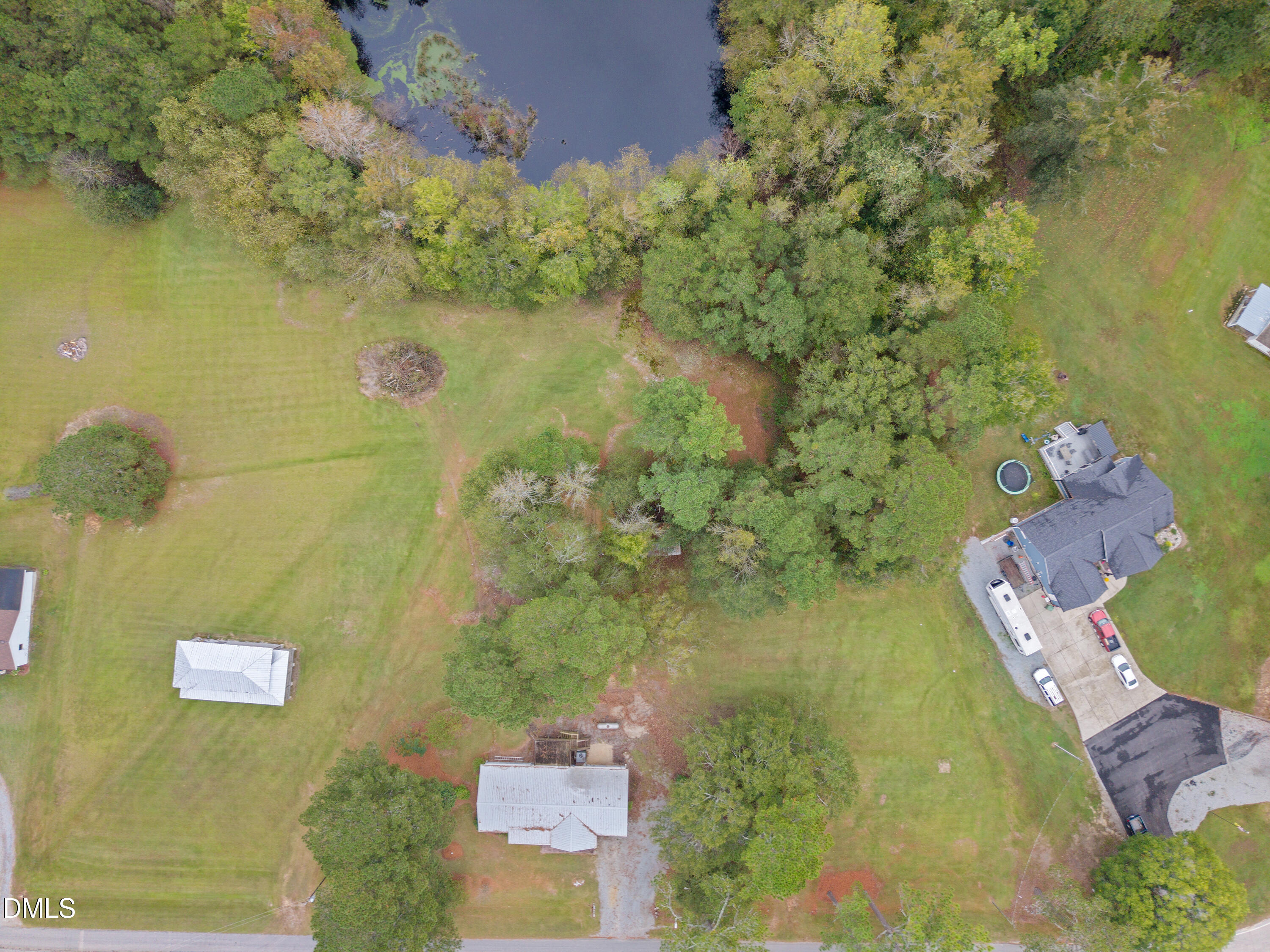 821 Penny Road Angier, NC 27501 - Photo 22 of 25 an aerial view of residential house with outdoor space