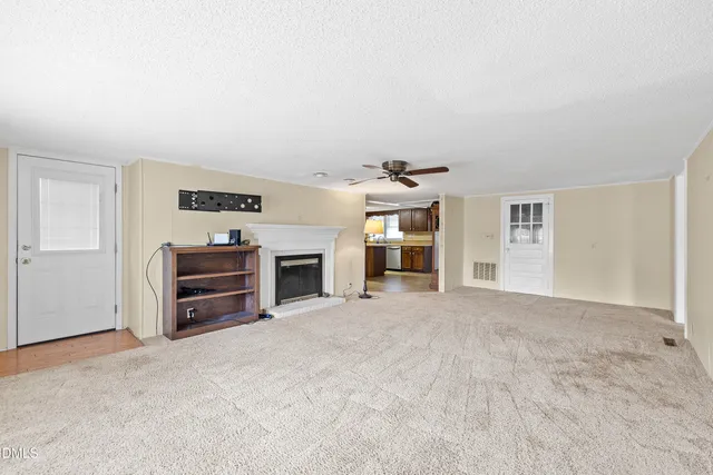 a view of a livingroom with furniture