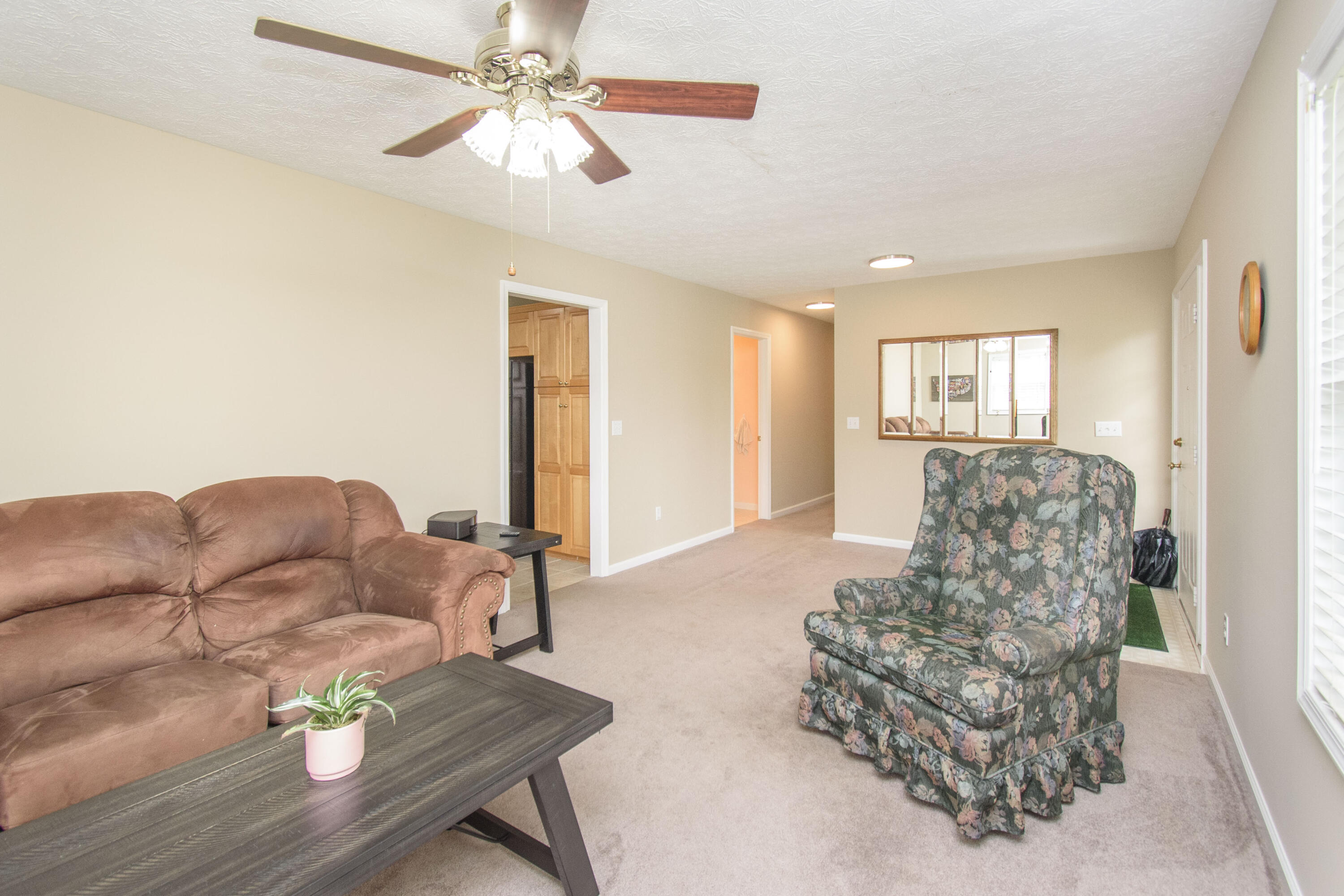 584 Kings Store Road Northeast Floyd, VA 24091 - Photo 17 of 51 a living room with furniture and a flat screen tv