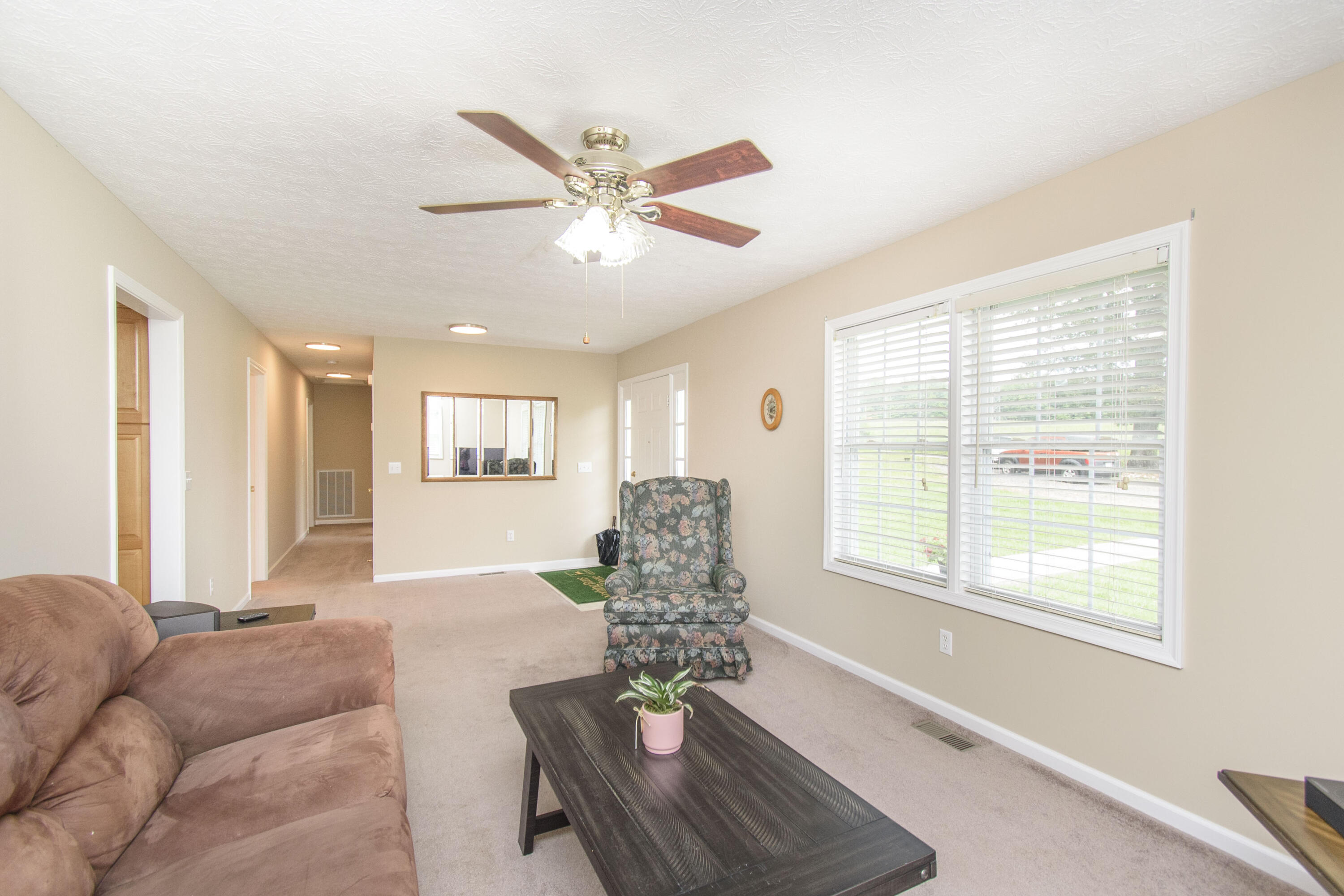 584 Kings Store Road Northeast Floyd, VA 24091 - Photo 18 of 51 a living room with furniture and a large window