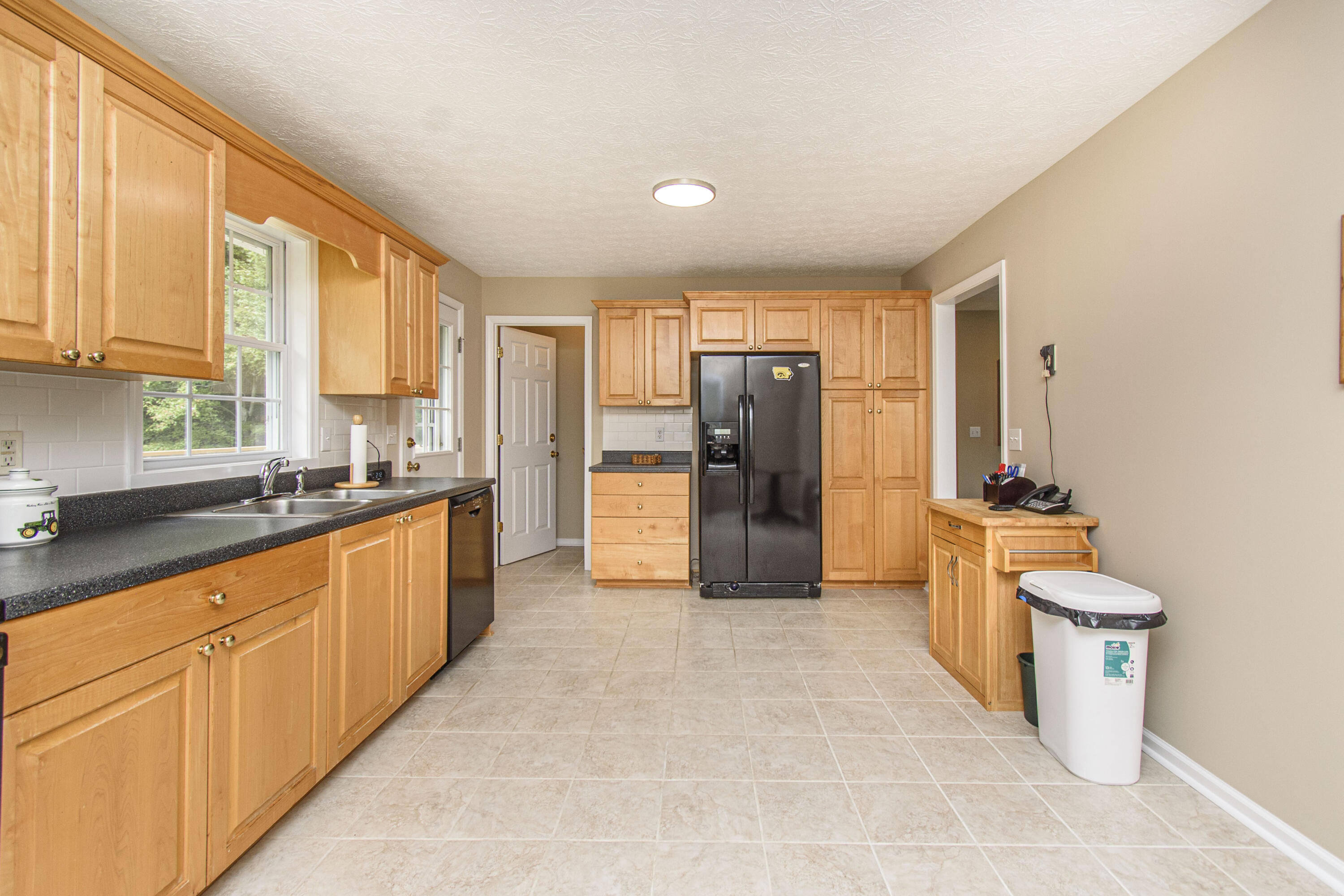 584 Kings Store Road Northeast Floyd, VA 24091 - Photo 22 of 51 a large kitchen with stainless steel appliances granite countertop a refrigerator and a sink