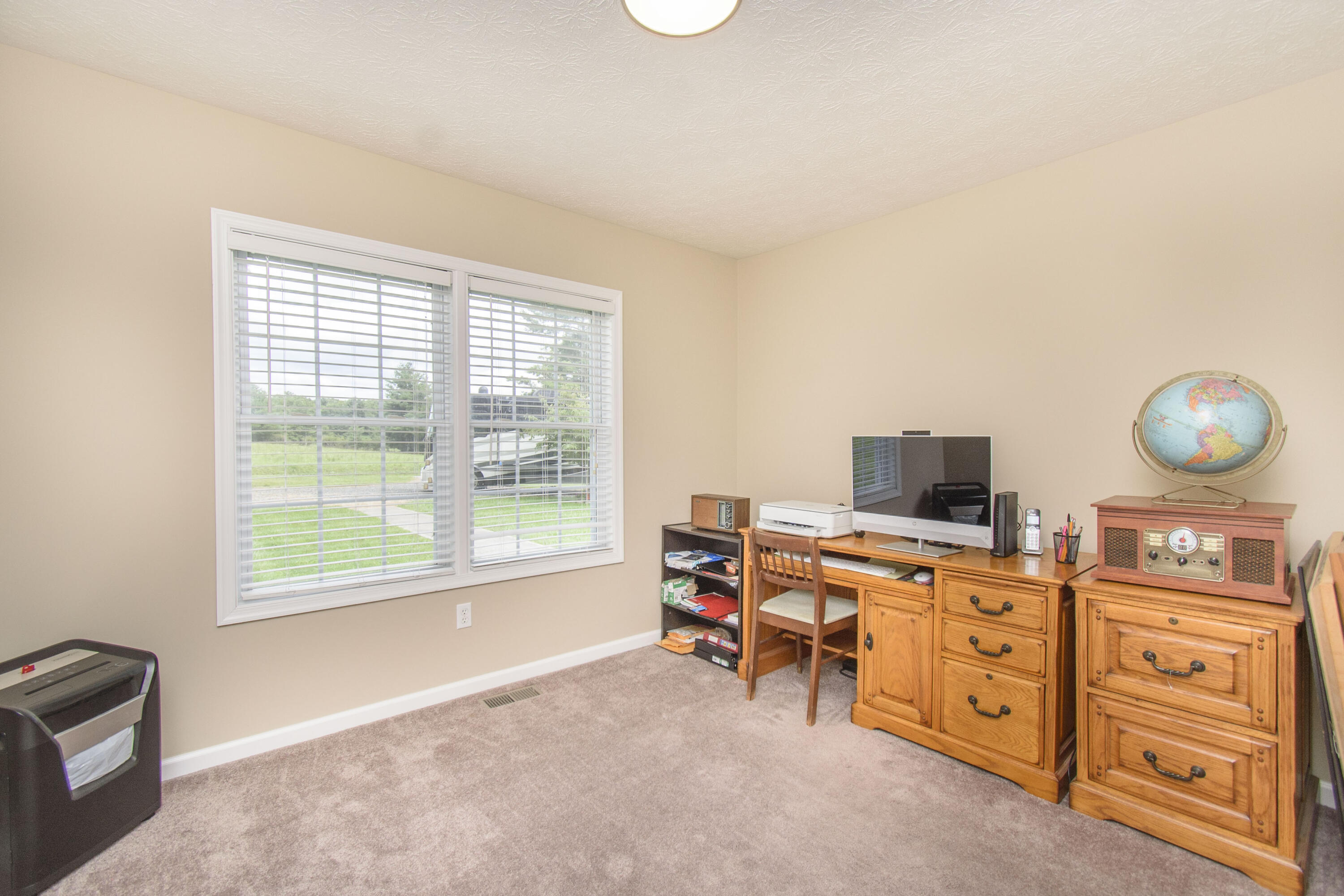 584 Kings Store Road Northeast Floyd, VA 24091 - Photo 26 of 51 a view of a workspace with furniture and a window