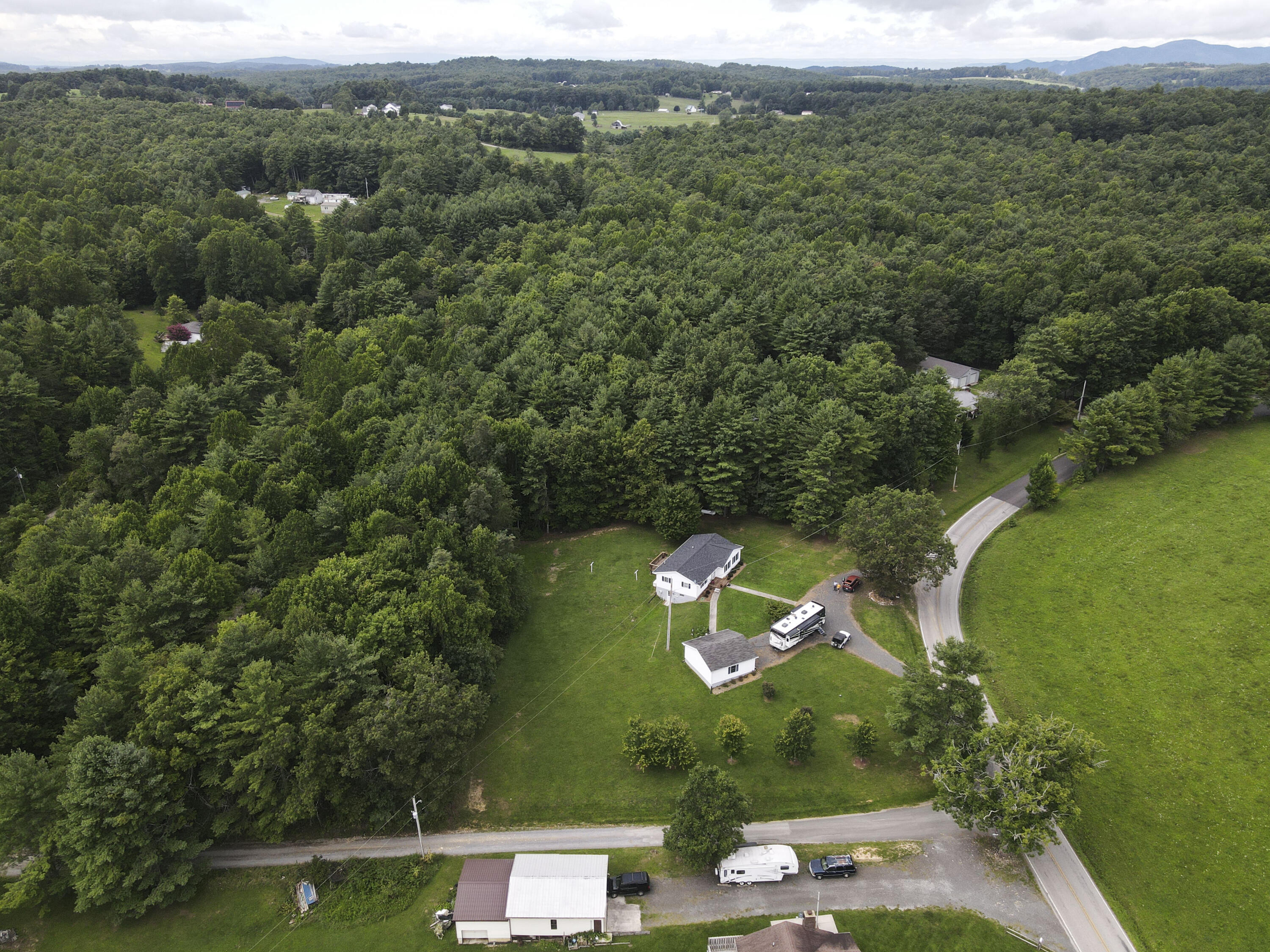 584 Kings Store Road Northeast Floyd, VA 24091 - Photo 46 of 51 an aerial view of a house with a garden