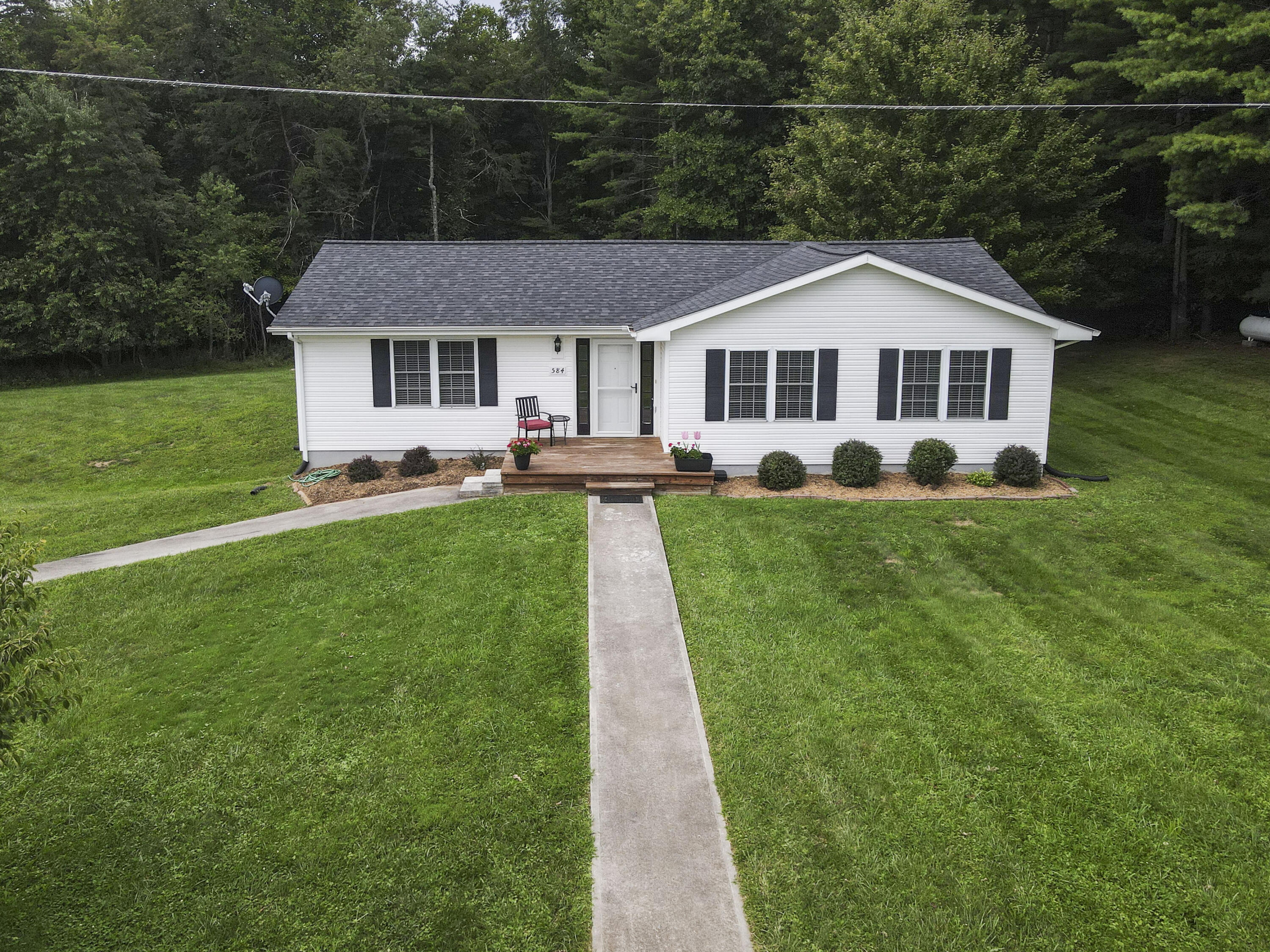 584 Kings Store Road Northeast Floyd, VA 24091 - Photo 5 of 51 a front view of a house with a yard