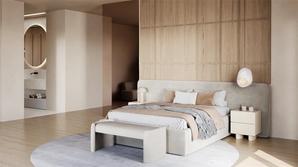 9716 Oak Pass Road Beverly Hills, CA 90210 - Photo 26 of 63 a bedroom with a bed and wooden floor