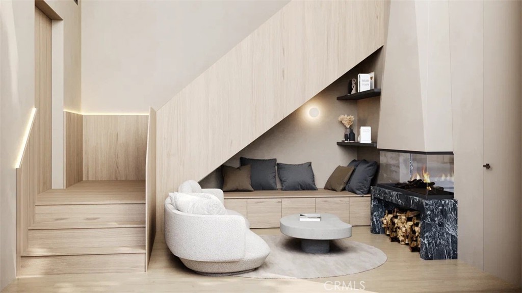 9716 Oak Pass Road Beverly Hills, CA 90210 - Photo 35 of 63 a living room with furniture and stairs