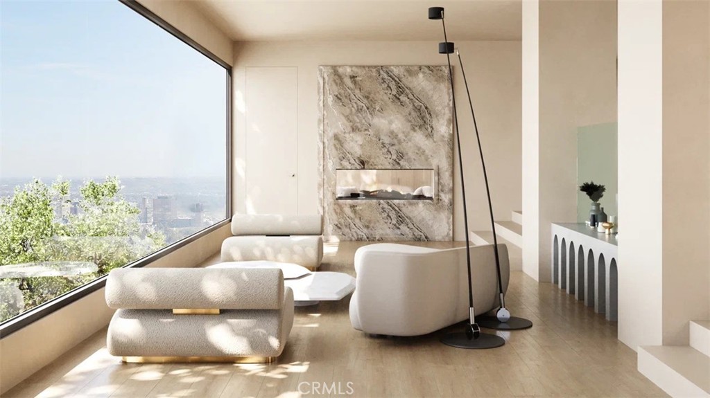 9716 Oak Pass Road Beverly Hills, CA 90210 - Photo 4 of 63 a living room with furniture and a large window